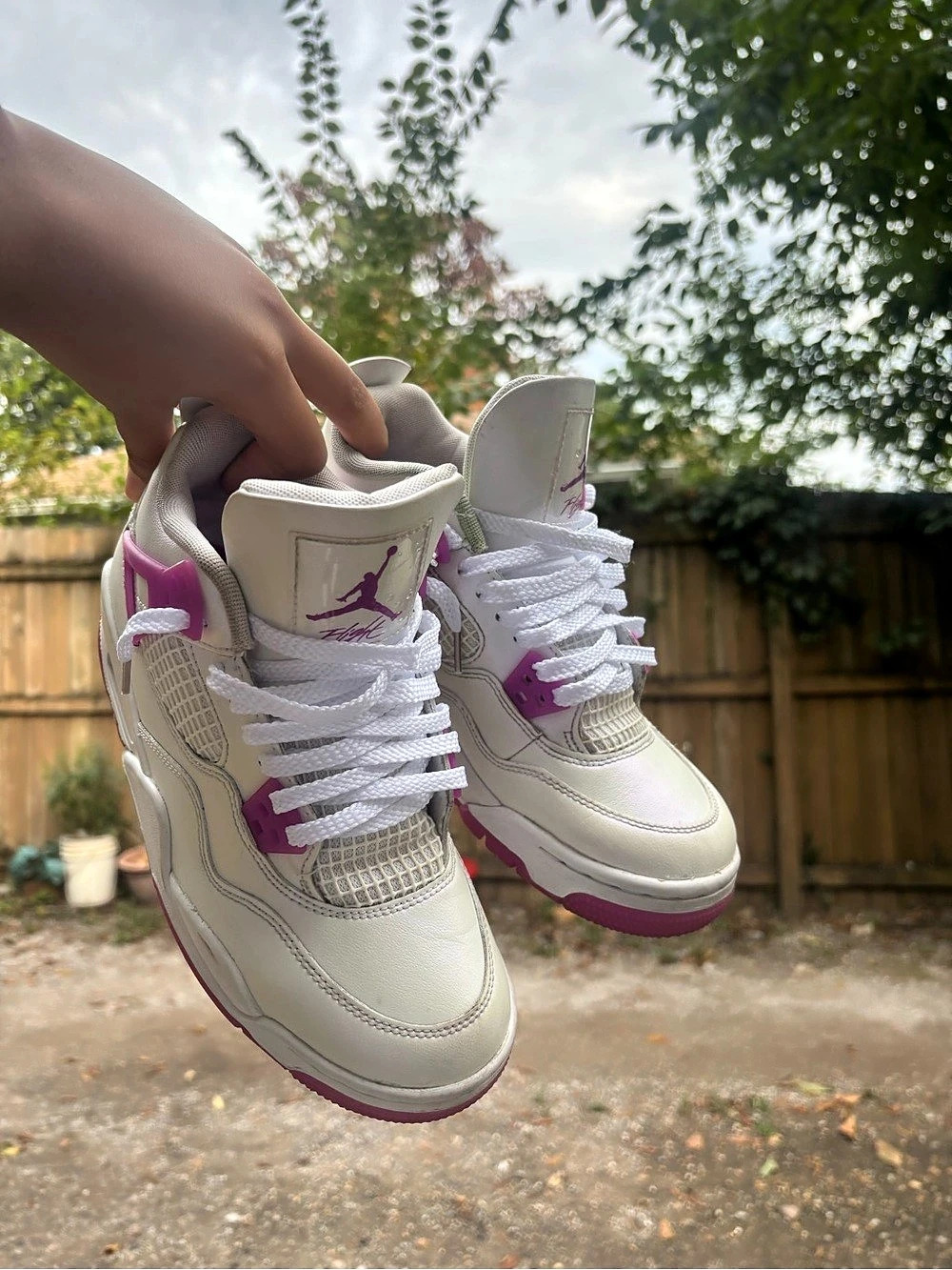 Jordan Air Jordan 4 Retro Orchid Sneakers in White & Pink